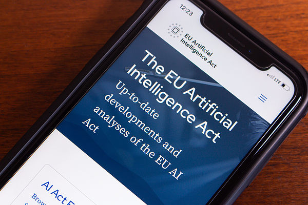  EU Artificial Intelligence Act website seen in an iPhone. EU AI Act is a law established by the European Union to regulate the use of AI technology