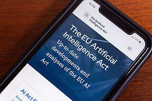  EU Artificial Intelligence Act website seen in an iPhone. EU AI Act is a law established by the European Union to regulate the use of AI technology