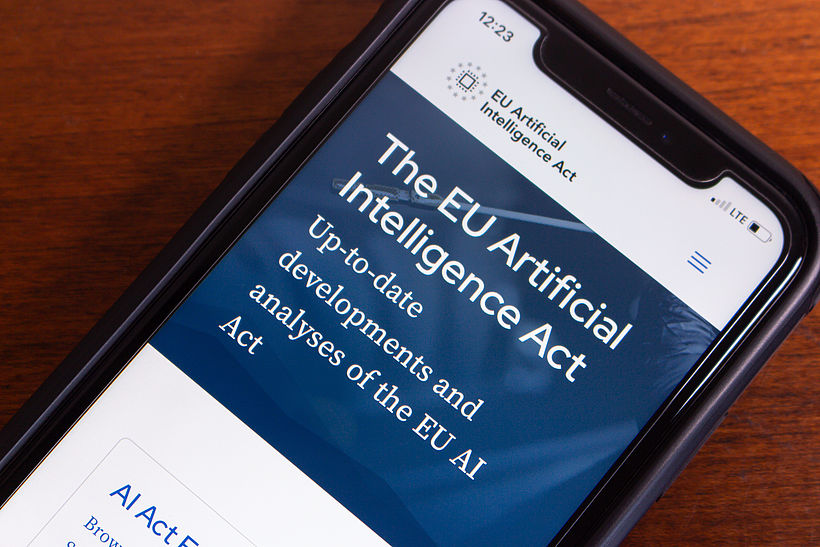  EU Artificial Intelligence Act website seen in an iPhone. EU AI Act is a law established by the European Union to regulate the use of AI technology